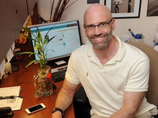 Professor Justin Miller reduces waste in the classroom through the use of technology.